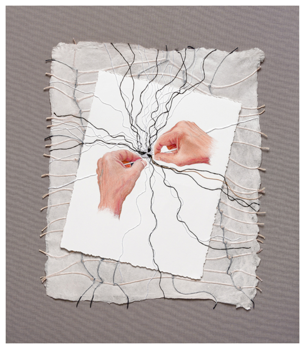This is a self portrait. These are my hands creating a knotted element.